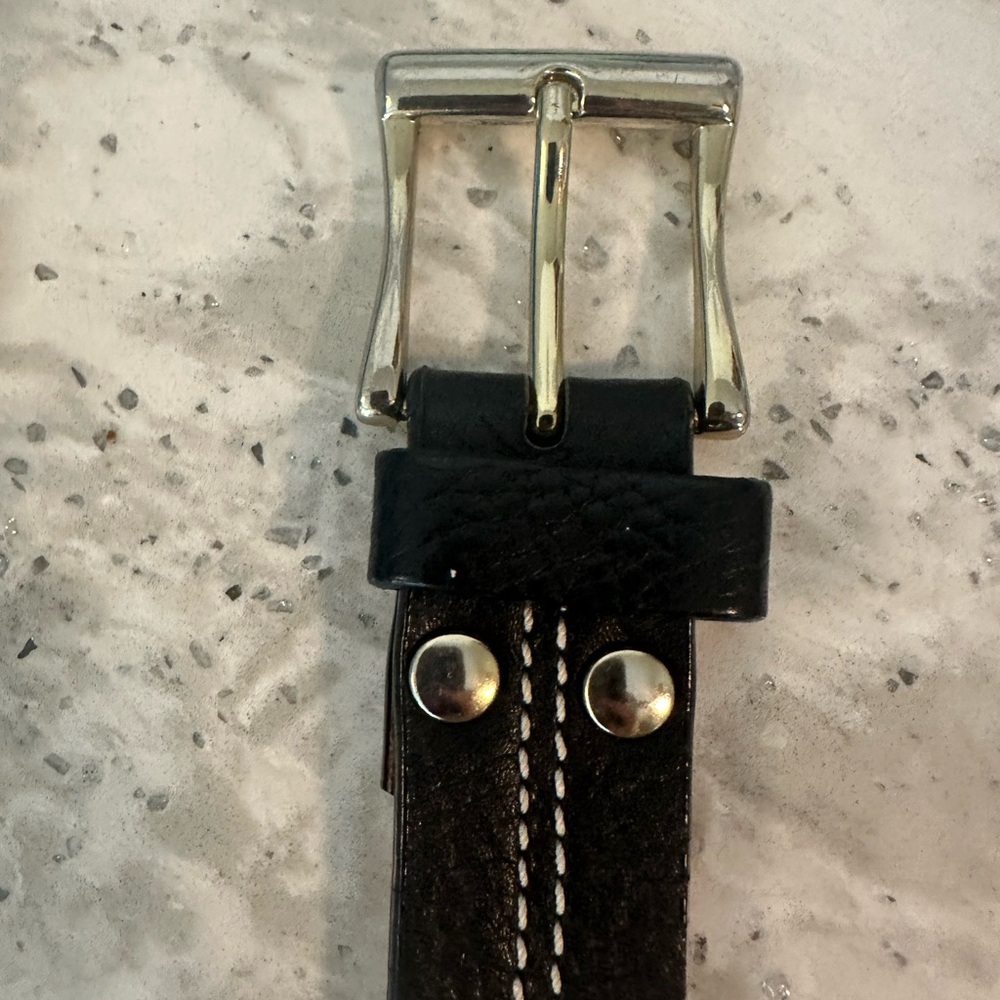 J.McLaughlin Black leather belt with white stitching and a gold buckle